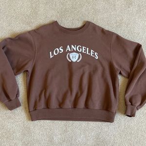 Brown cropped crew neck. Only worn a few times.